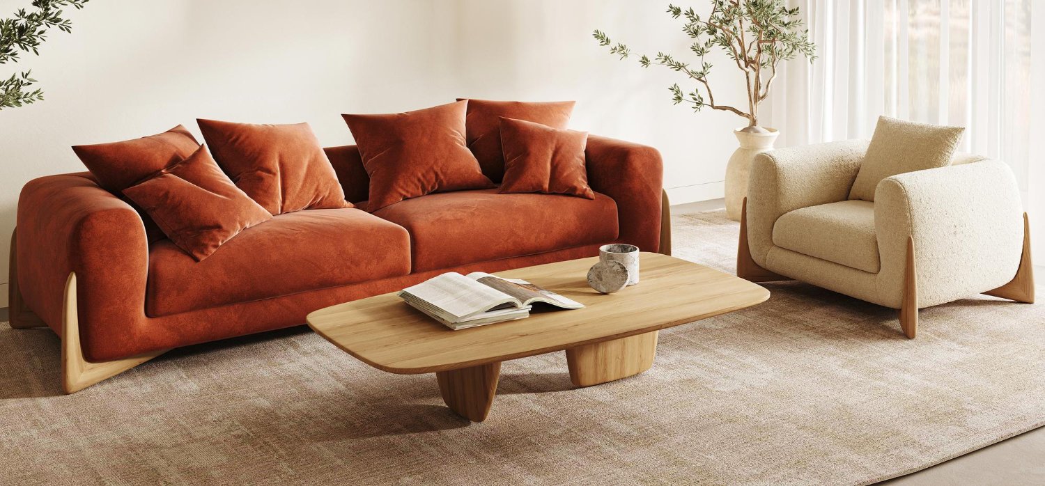 Espace de vie scandinave moderne avec un canapé moelleux couleur terre cuite et des touches décoratives élégantes.