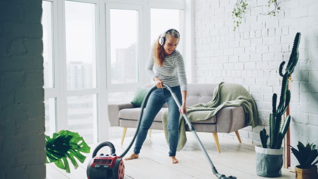 https://www.pexels.com/photo/woman-vacuuming-modern-living-room-36715255/