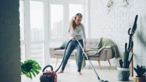 https://www.pexels.com/photo/woman-vacuuming-modern-living-room-36715255/